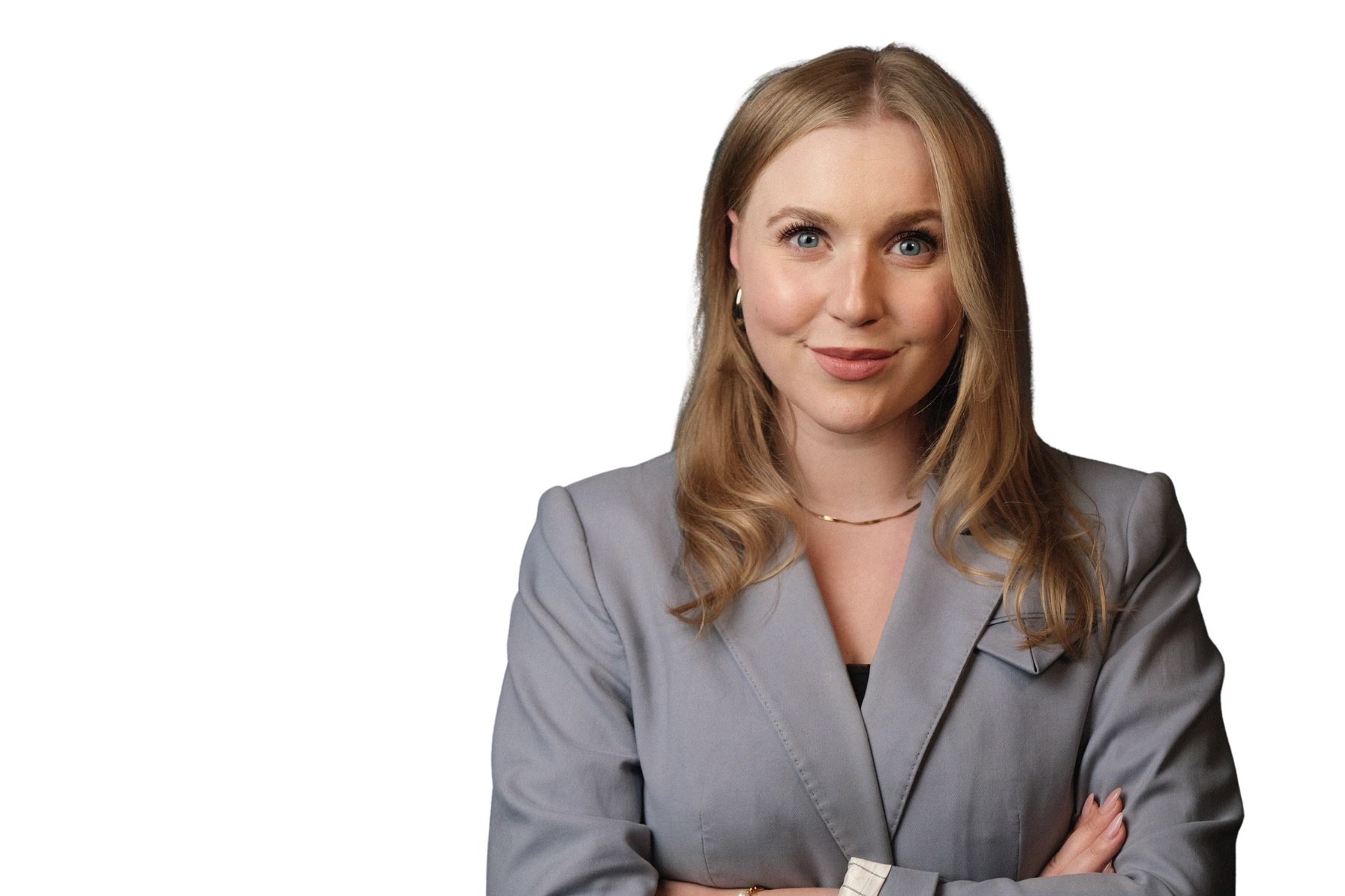 Freigestelltes Porträt von Hendrikje Rudnick, redaktionelle Co-Leiterin bei Business Insider. Sie trägt einen eleganten grauen Blazer, hat die Arme selbstbewusst verschränkt und lächelt in die Kamera.