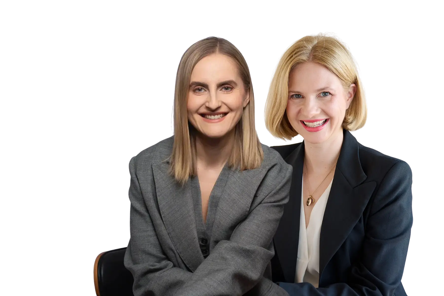 Gemeinsames Porträt von Nele Odzuck (TikTok) im grauen Blazer und Marlies Gebetsberger (Philips) im dunklen Blazer, beide lächelnd vor schwarzem Hintergrund.